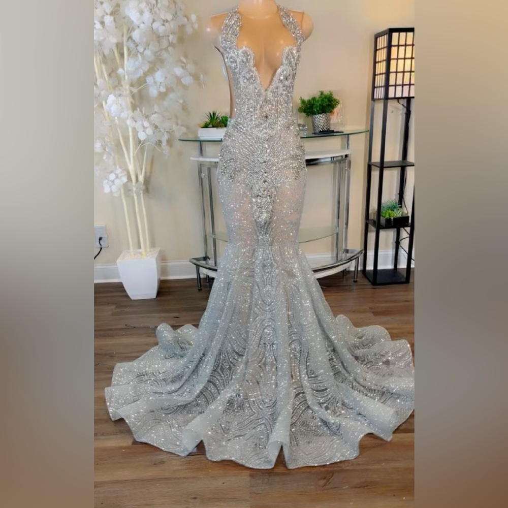 CUSTOM made prom dress drenched in beautiful studs.